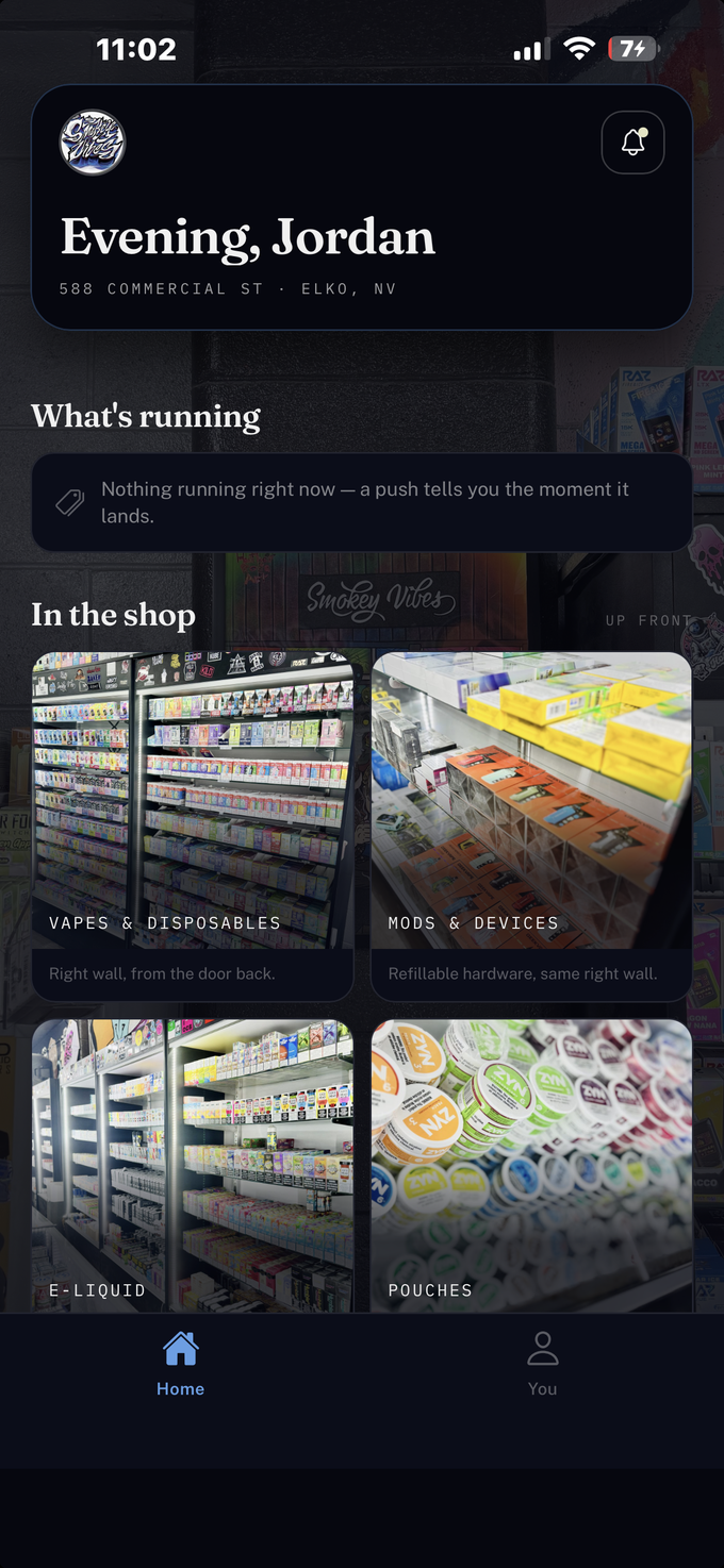 Smokey Vibes home screen: the shop laid out by section, shot on the shelf.